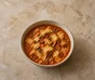 Sopa de lasaña con ternera y trozos de pasta bajo una cobertura dorada de mascarpone y parmesano